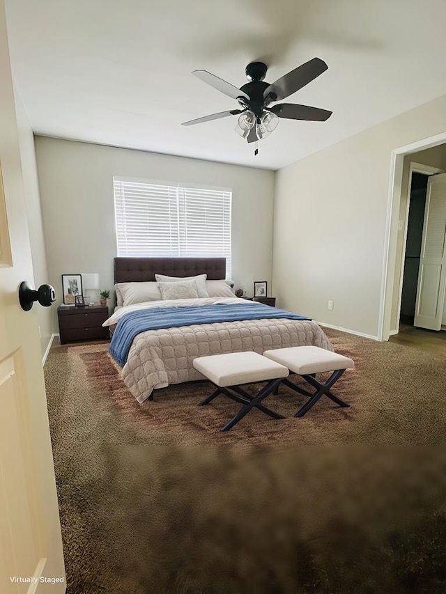 carpeted bedroom with ceiling fan