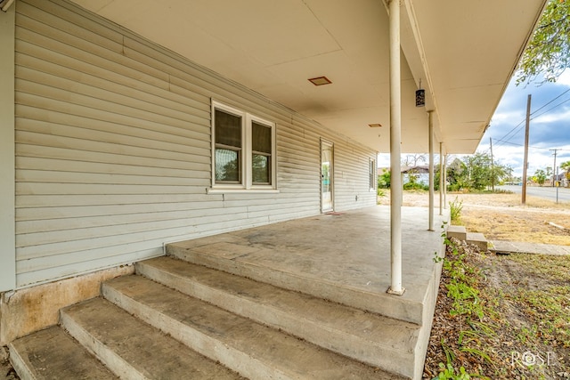 view of patio featuring a porch