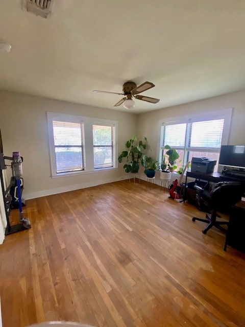 925 E 40th St, San Angelo, TX 76903 - office with light wood finished floors, ceiling fan, and baseboards