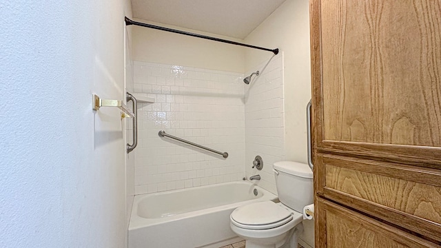 bathroom with toilet and shower / tub combination