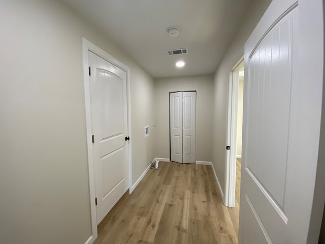 hallway featuring light hardwood / wood-style floors