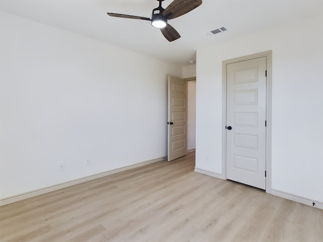 unfurnished bedroom with ceiling fan and light hardwood / wood-style floors