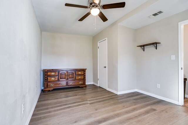 106 W 27th St, San Angelo, TX 76903 - empty room featuring wood finished floors and a ceiling fan