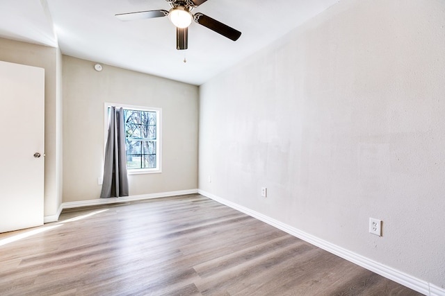 106 W 27th St, San Angelo, TX 76903 - unfurnished room featuring ceiling fan and wood finished floors