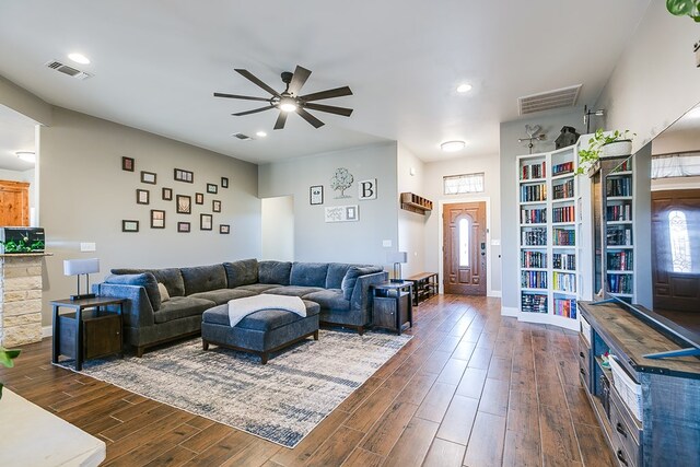 living room featuring ceiling fan