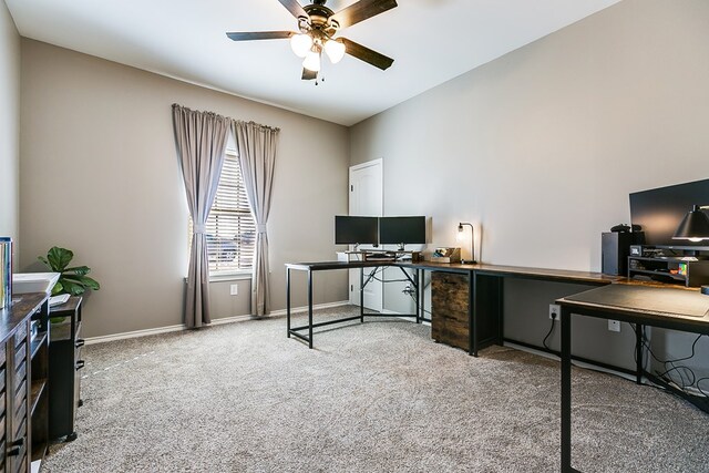 office area with carpet floors and ceiling fan