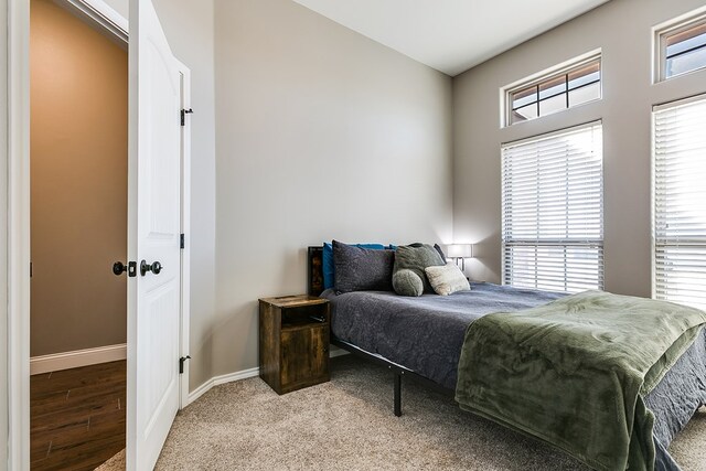 bedroom featuring multiple windows