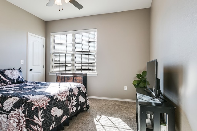 bedroom featuring light carpet and ceiling fan