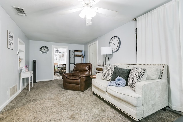 421 N Archer St, San Angelo, TX 76903 - carpeted living room featuring ceiling fan and baseboards