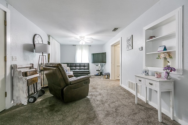 421 N Archer St, San Angelo, TX 76903 - carpeted living area with ceiling fan