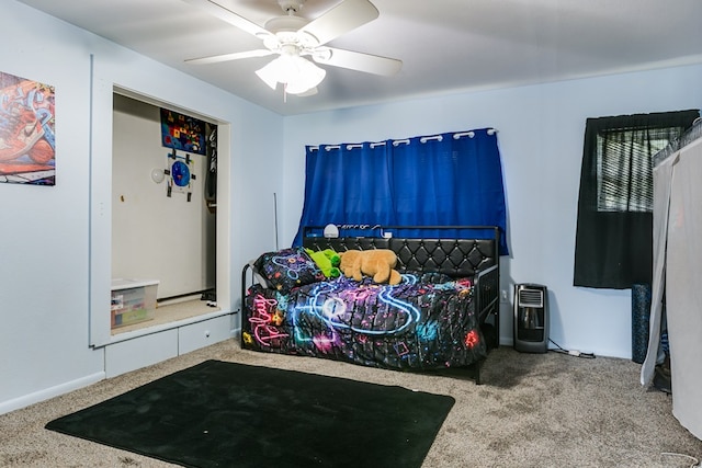 421 N Archer St, San Angelo, TX 76903 - bedroom with carpet flooring, a ceiling fan, and baseboards
