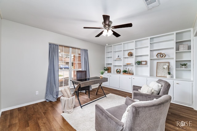 office space with ceiling fan and dark hardwood / wood-style flooring