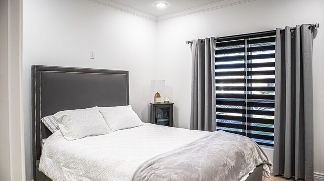 bedroom featuring ornamental molding