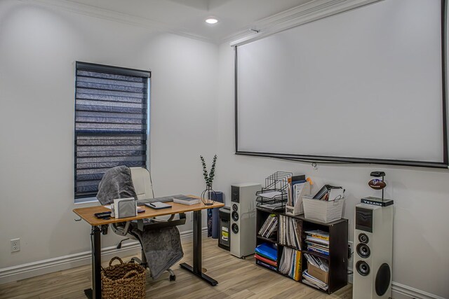 office area featuring light hardwood / wood-style flooring and ornamental molding