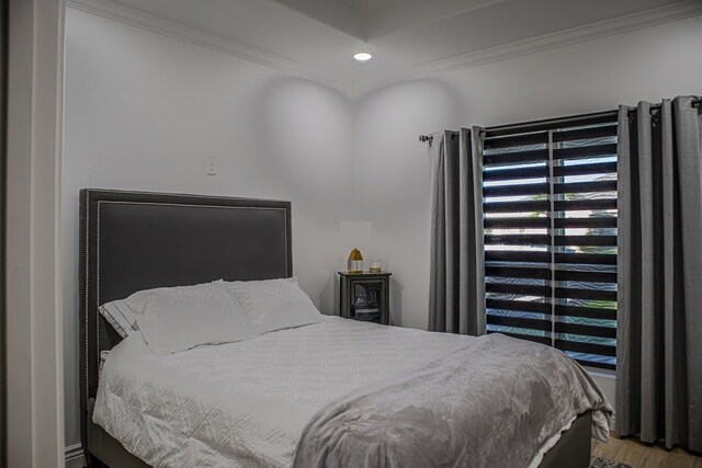 bedroom featuring ornamental molding