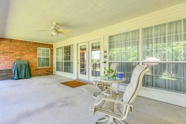 view of patio featuring a ceiling fan