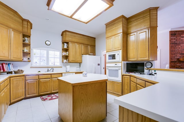 kitchen with a center island, light countertops, open shelves, and white appliances