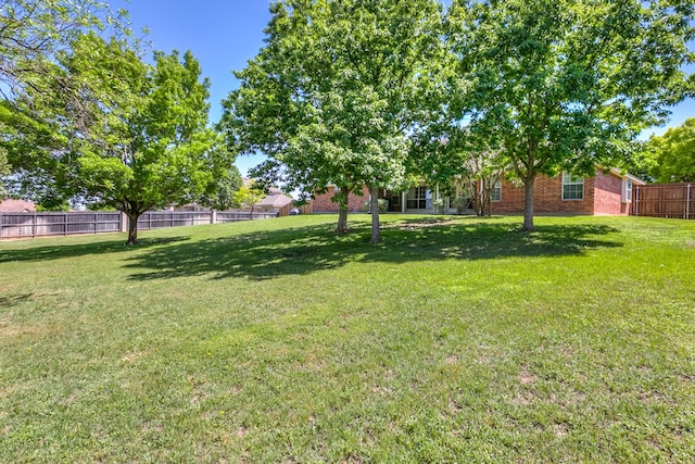 view of yard featuring fence