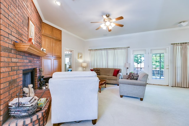 living room featuring crown molding, ceiling fan, a brick fireplace, and light colored carpet
