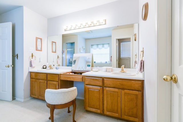 full bath featuring double vanity and a sink