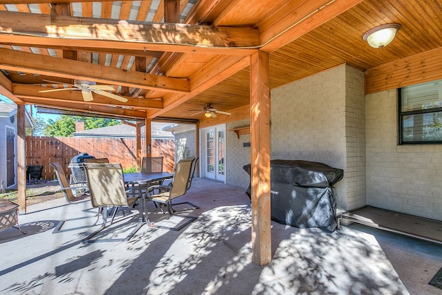 view of patio with french doors, ceiling fan, and a grill