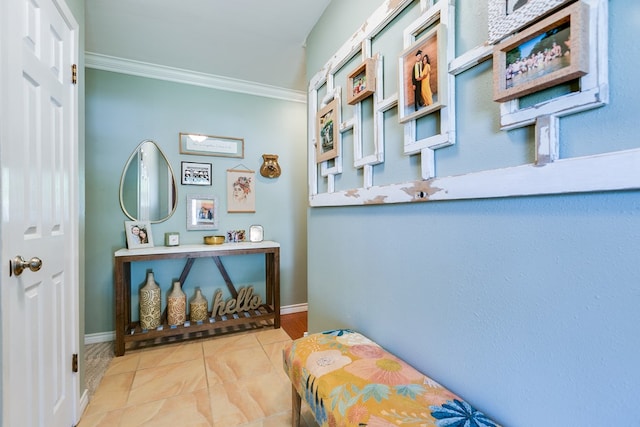 interior space with crown molding and light tile patterned floors