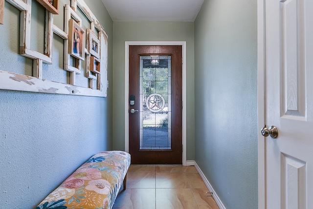 doorway featuring light tile patterned floors