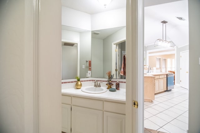 bathroom with vanity, visible vents, and tile patterned floors