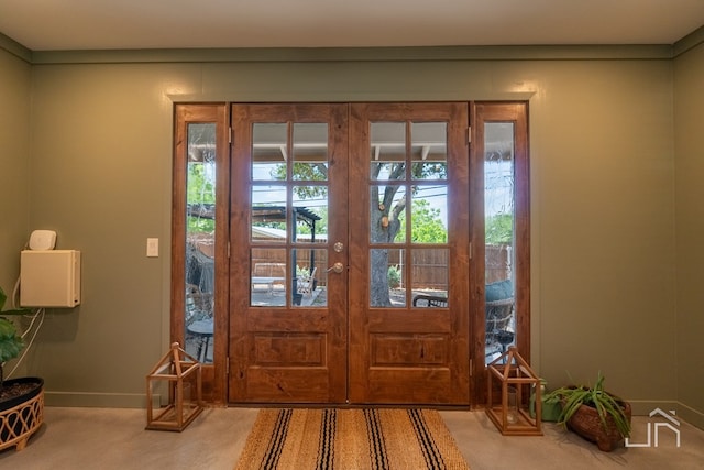 foyer entrance featuring french doors