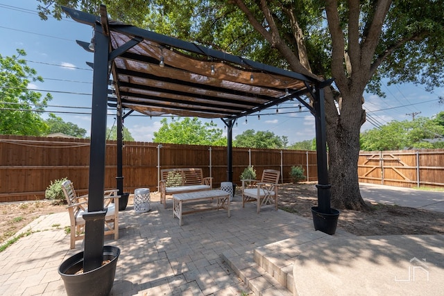 view of patio with an outdoor living space and a pergola