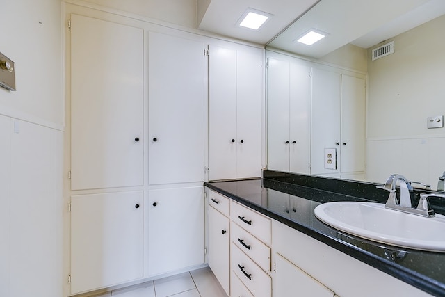 2472-D University Ave, San Angelo, TX 76904 - bathroom featuring vanity and a wainscoted wall