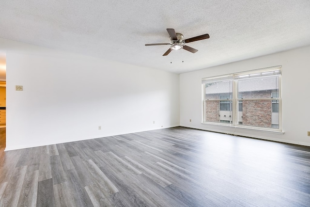 2472-D University Ave, San Angelo, TX 76904 - empty room with wood finished floors, a ceiling fan, a textured ceiling, and baseboards
