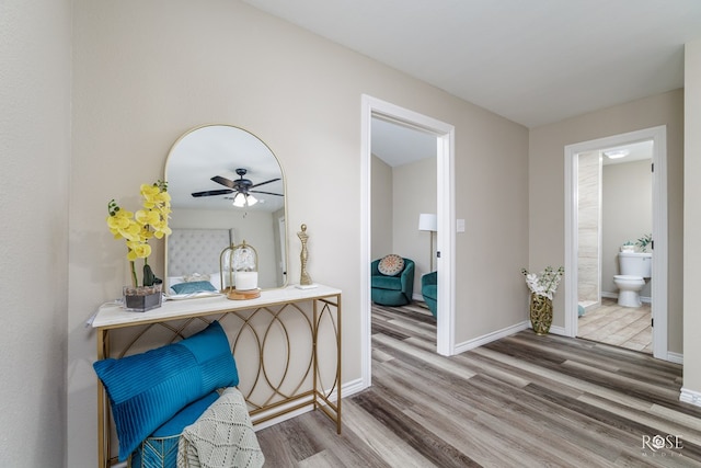 corridor featuring hardwood / wood-style floors