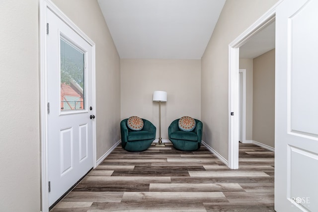 sitting room with hardwood / wood-style floors