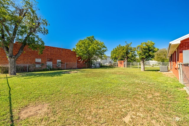 view of yard featuring central AC unit