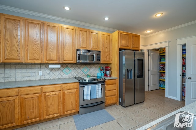 kitchen featuring stainless steel appliances, ornamental molding, tasteful backsplash, and light tile patterned flooring