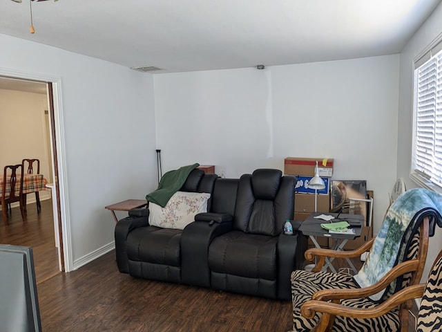 living room with dark wood-type flooring