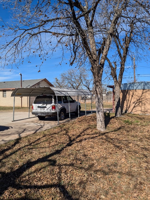 view of yard featuring a carport