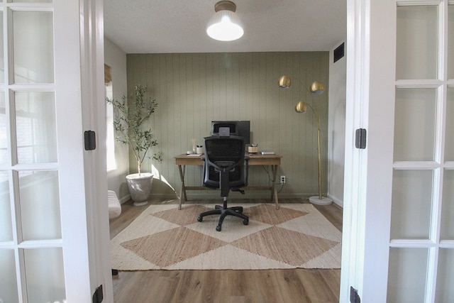 office with hardwood / wood-style floors