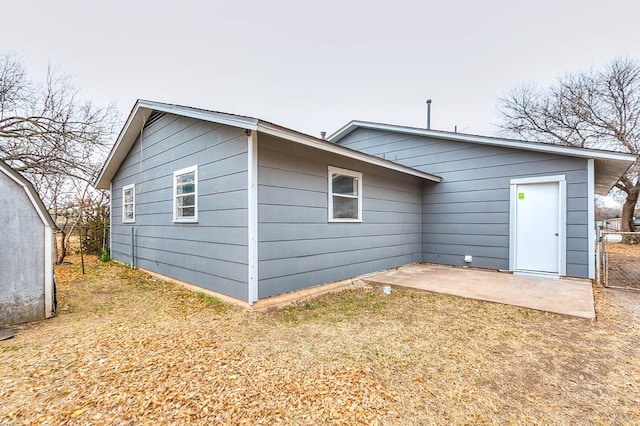 back of house featuring a patio