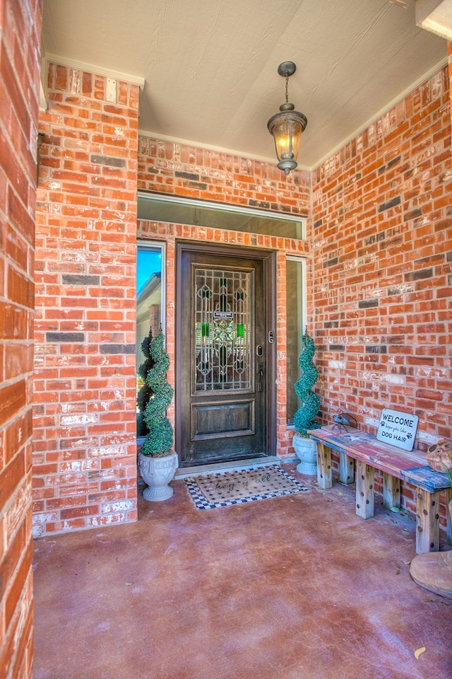 6023 Warwick Dr, San Angelo, TX 76904 - entrance to property featuring brick siding