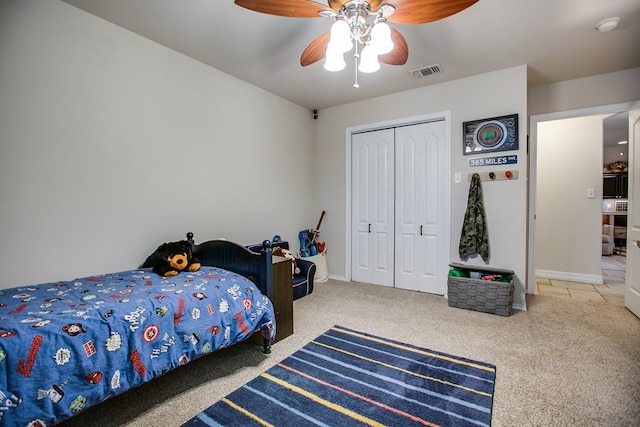 6023 Warwick Dr, San Angelo, TX 76904 - carpeted bedroom with a closet and ceiling fan