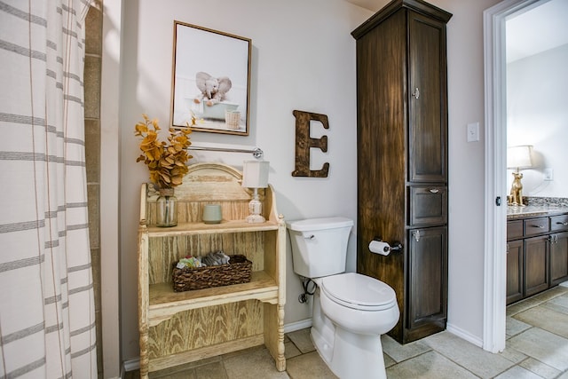 6023 Warwick Dr, San Angelo, TX 76904 - bathroom with toilet and vanity