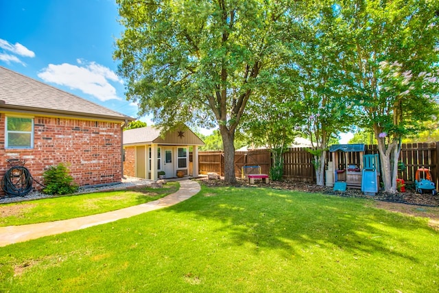 6023 Warwick Dr, San Angelo, TX 76904 - fenced backyard featuring an outbuilding
