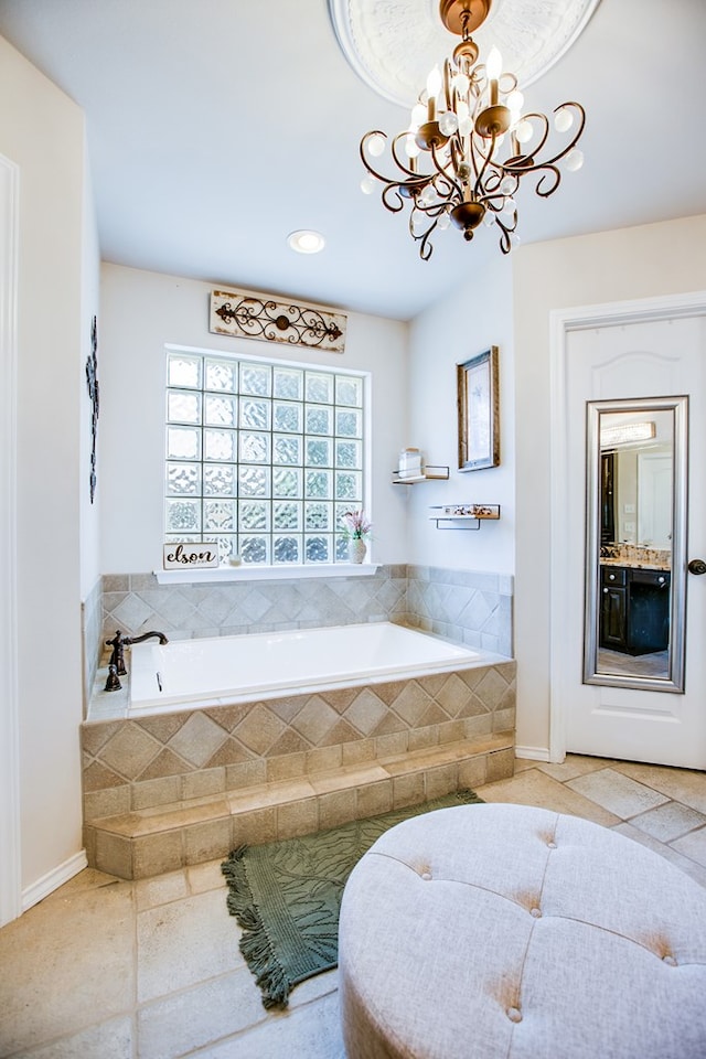 6023 Warwick Dr, San Angelo, TX 76904 - bathroom with a bath, a chandelier, tile patterned flooring, and recessed lighting