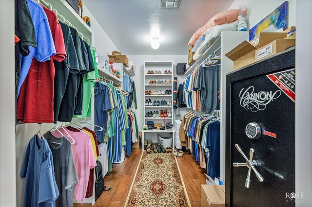 spacious closet with visible vents and wood finished floors