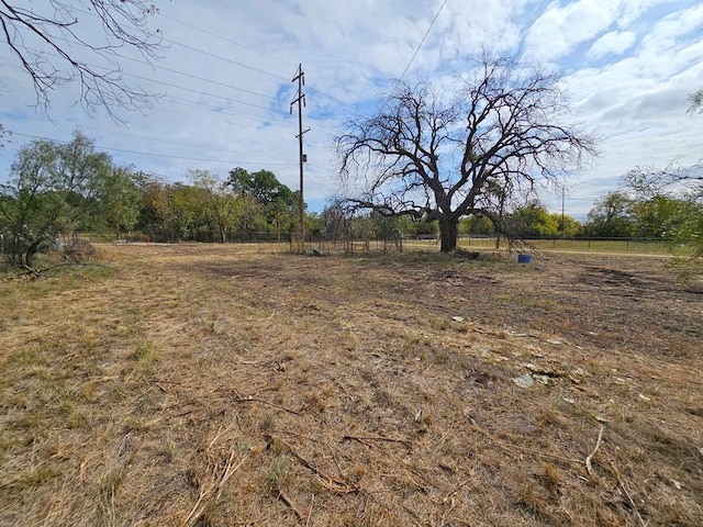 view of yard with a rural view