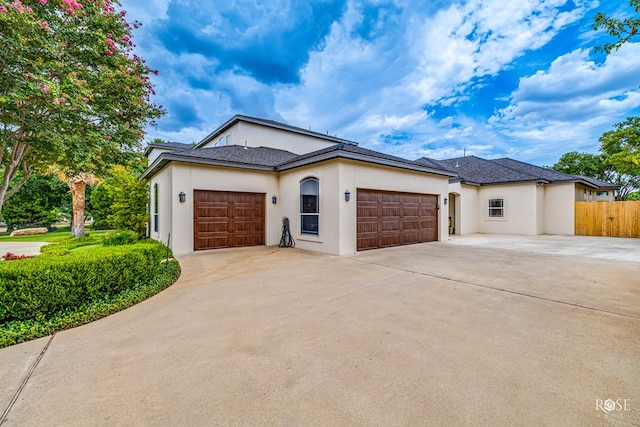 view of front of home featuring a garage