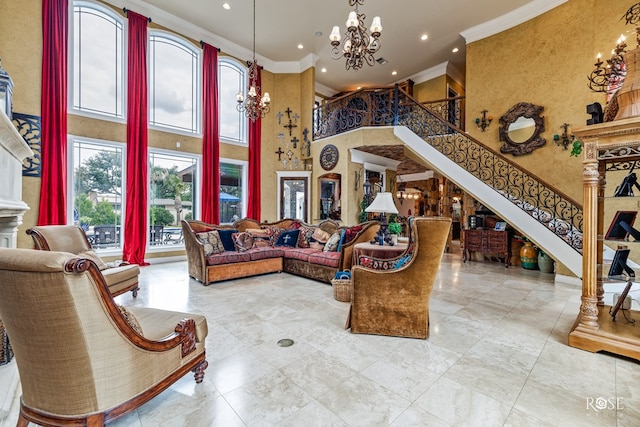 interior space with a high ceiling, crown molding, and a chandelier