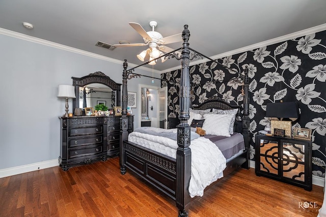 bedroom with ceiling fan, hardwood / wood-style flooring, and crown molding